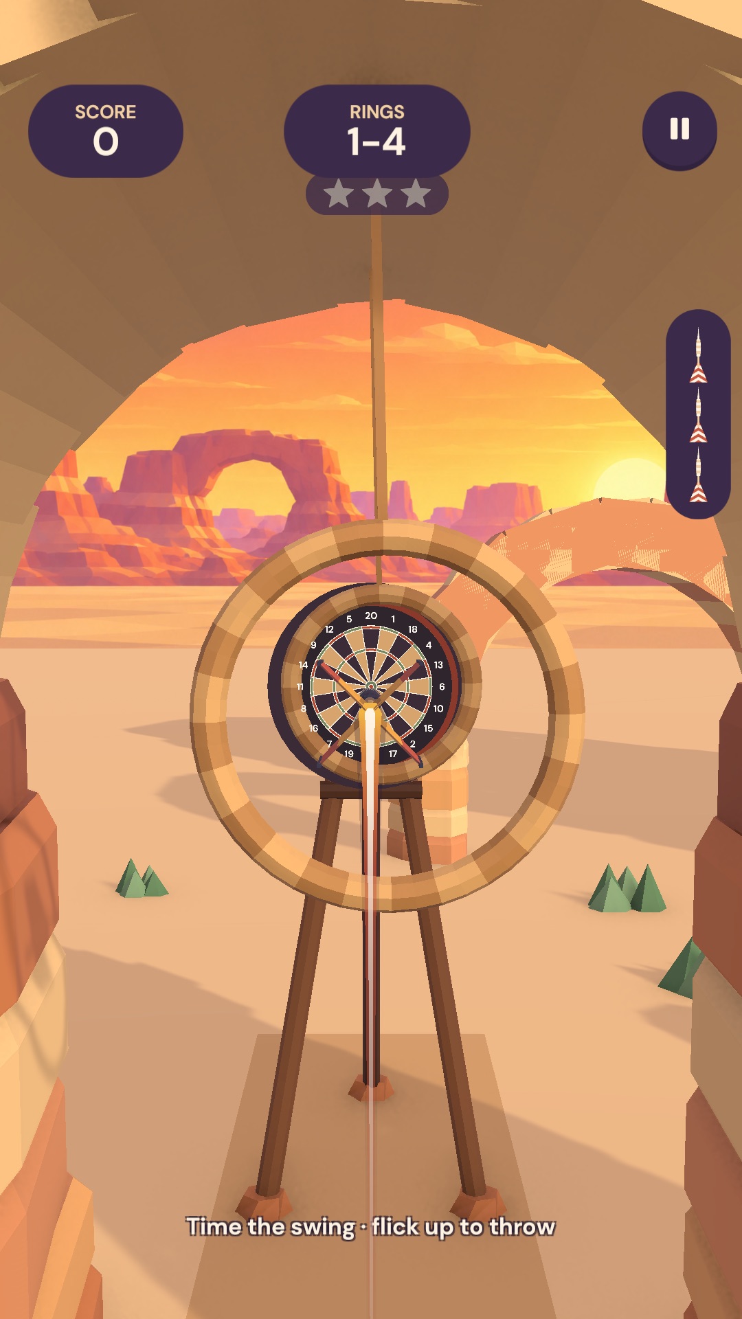 Flying a dart through swinging rings